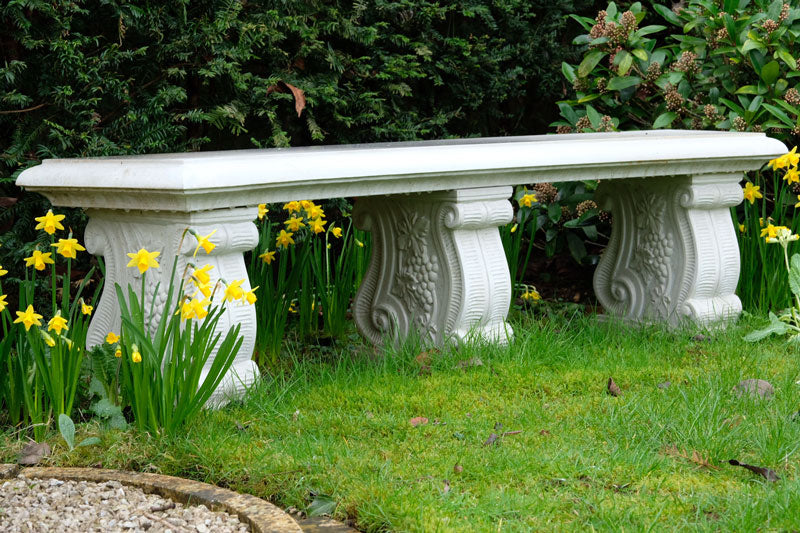 Classic stone bench with curved seat